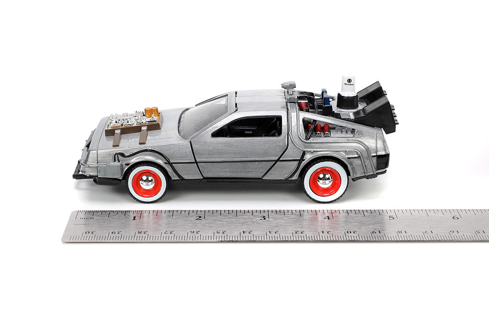 Poki - Regresso ao Futuro: Figura Doc Brown Delorean Presente · SD Toys ·  El Corte Inglés