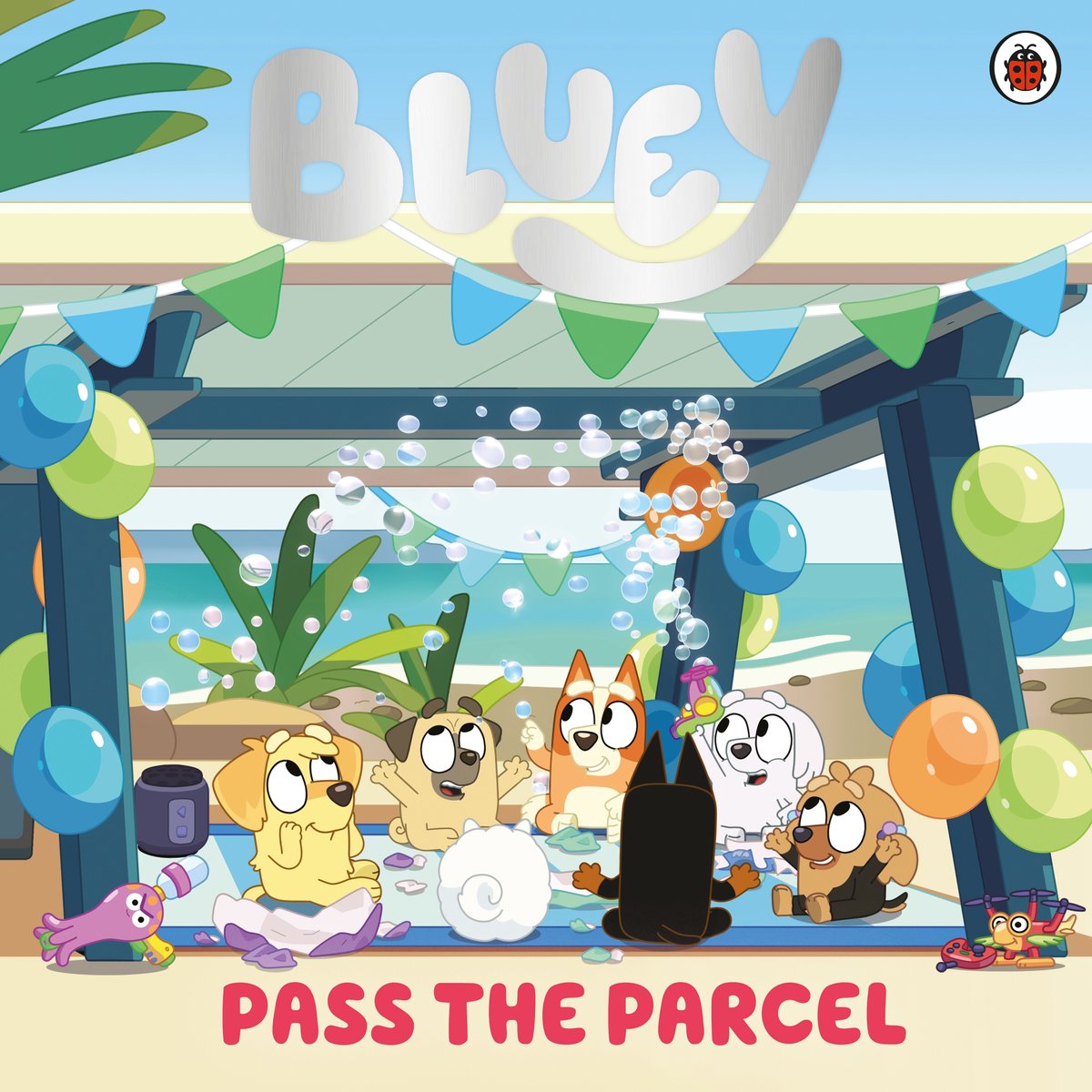 Bluey: Pass the Parcel - Bluey | Książka w Empik