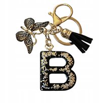 Brelok z literą B - elegancki czarny design z motylem