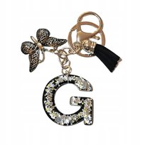 Brelok z literą G - elegancki czarny design z motylem