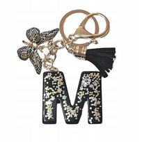 Brelok z literą M - elegancki czarny design z motylem