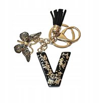 Brelok z literą V - elegancki czarny design z motylem