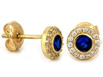 Kolczyki złote 375 małe okrągłe z cyrkoniami z niebieskim oczkiem 1.28g