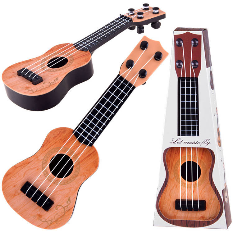 Фото - Дитячий набір для гри JB Mini gitarka dla dzieci ukulele 25 cm IN0154 