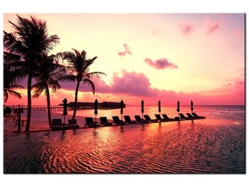Obraz Zachód słońca w różu na plaży na Malediwach, 30x20 cm - Oobrazy
