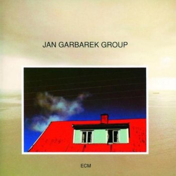 Photo with Blue Sky, White Cloud, Wires, Windows and a Red Roof - Garbarek Jan