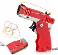 PISTOLET ZABAWKA NA GUMKI RECEPTURKI BRELOCZEK PROCA STZRELANIE DO TARCZY