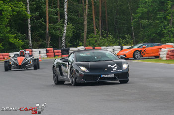 Przejazd Lamborghini Gallardo vs Ariel po torze Poznań Tor Kartingowy (1 okrążenie) - DEVIL CARS