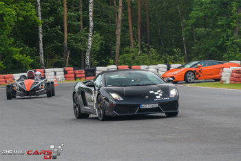 Przejazd Lamborghini Gallardo vs Ariel po torze Warszawa - Modlin (2 okrążenia) - DEVIL CARS