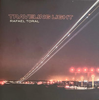 Traveling Light Toral Rafael