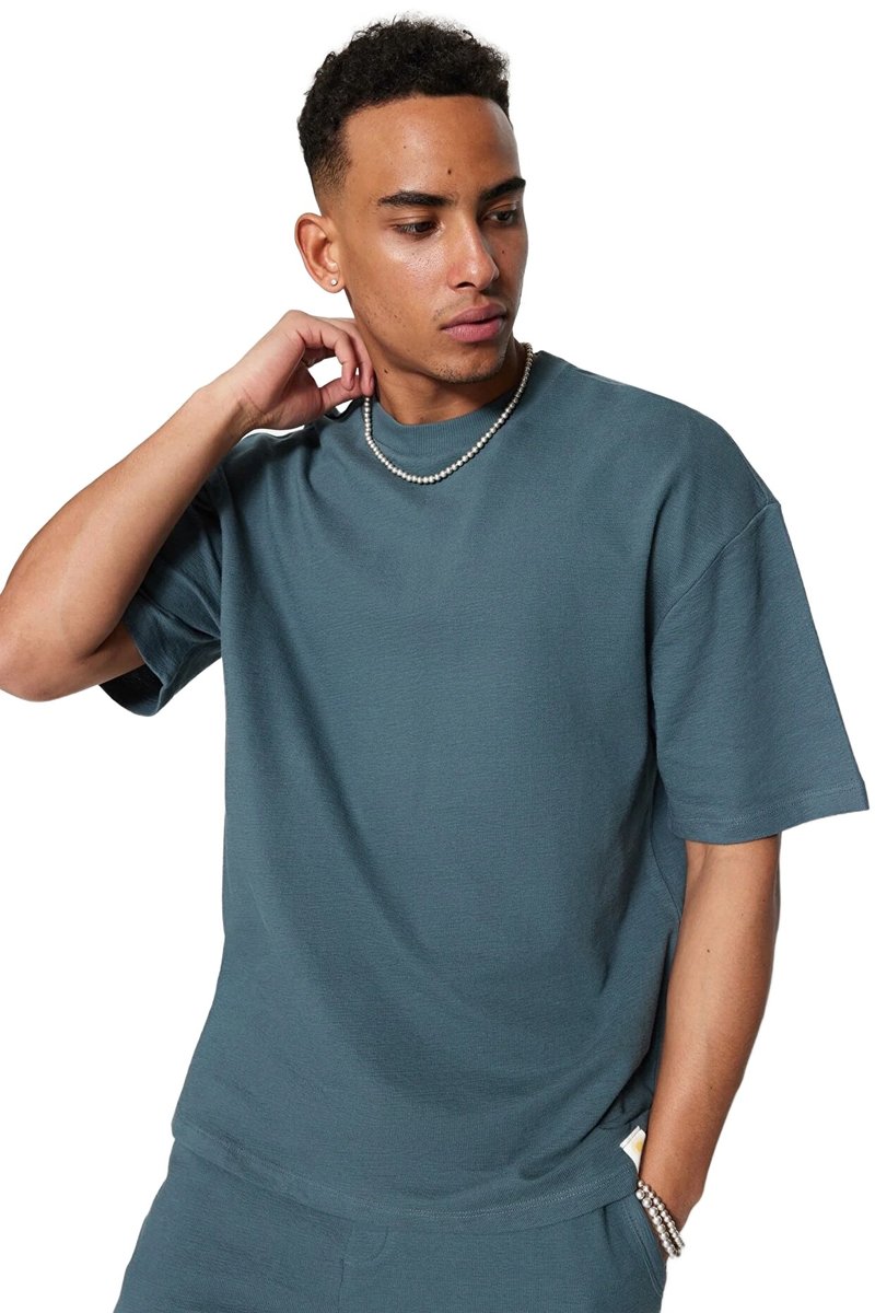 Trendyol TRENDYOL MAN MĘSKI T-SHIRT Z OKRĄGŁYM DEKOLTEM W KOLORZE NIEBIESKIM XS 5DA