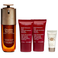 Zestaw Clarins: krem na dzień 15 ml, krem na noc 15 ml, serum do twarzy 50 ml oraz produkt SOS