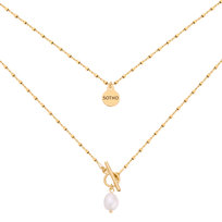 Złoty kosteczkowy naszyjnik z ozdobnym zapięciem i perłą