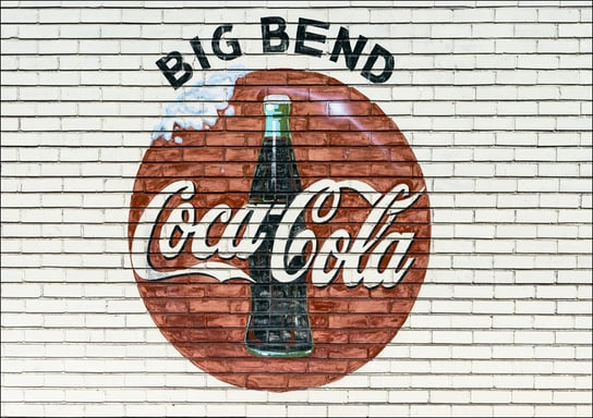 An old company sign appears on the wall of a Coca-Cola bottling plant outside Alpine, Texas., Carol Highsmith - plakat 59,4x42 cm Galeria Plakatu
