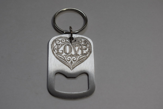 Brelok,otwieracz -"love" Inna marka