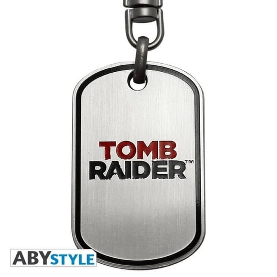 Brelok z logo TOMB RAIDER. Inna marka