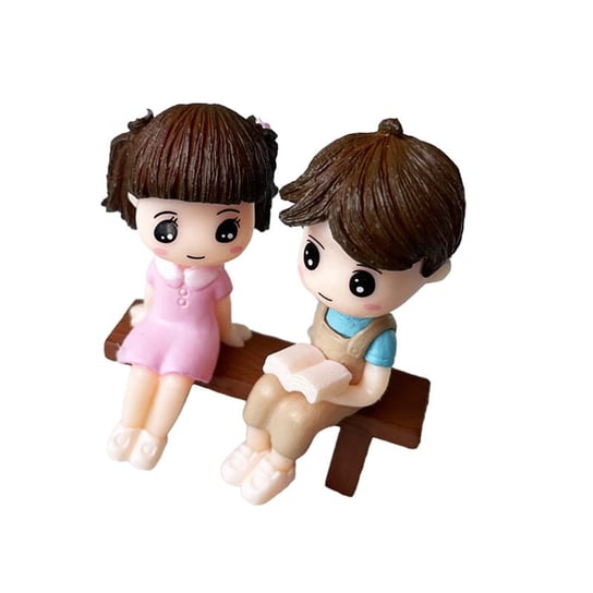 Figurki Dziewczynka w różowej sukience i chłopiec na ławce z książką HABARRI