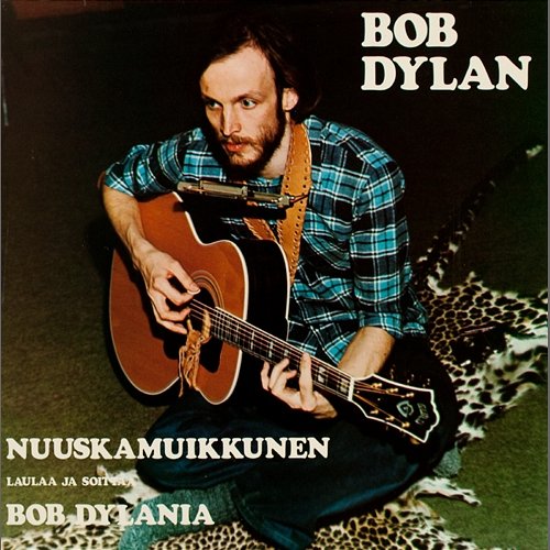 Laulaa ja soittaa Bob Dylania Nuuskamuikkunen