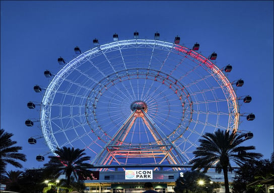 Neon-lit Ferris wheel at dusk in ICON Park in the Orlando, Florida., Carol Highsmith - plakat 100x70 cm Galeria Plakatu