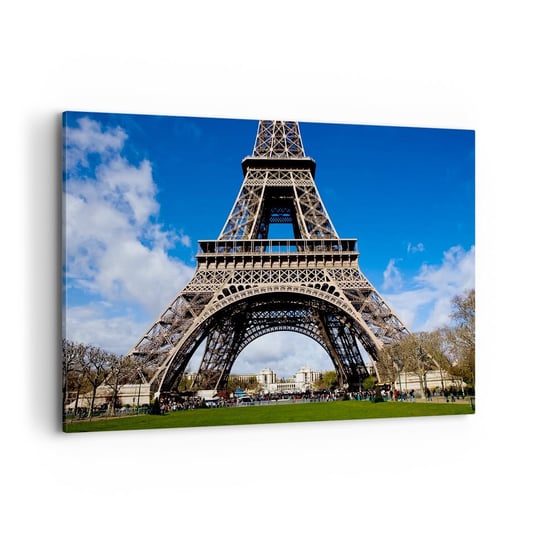 Obraz na płótnie - Cały Paryż u jej stóp - 100x70cm - Wieża Eiffla Paryż Architektura - Nowoczesny foto obraz w ramie do salonu do sypialni ARTTOR ARTTOR
