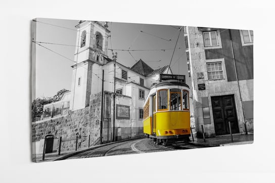 Obraz na płótnie HOMEPRINT,  czarno-białe zdęcie z żółtym tramwajem w dzielnicy Alfama Lisbon w Portugalii 100x50 cm HOMEPRINT