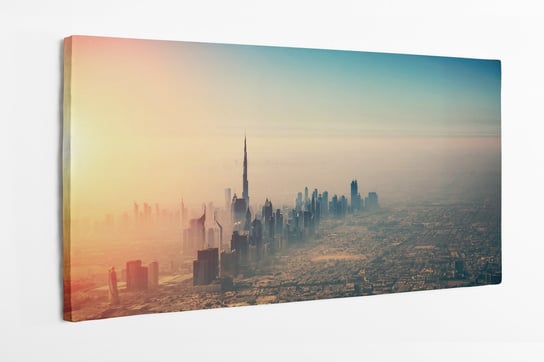 Obraz na płótnie HOMEPRINT, Dubaj o zachodzie słońca z lotu ptaka 140x70 cm HOMEPRINT
