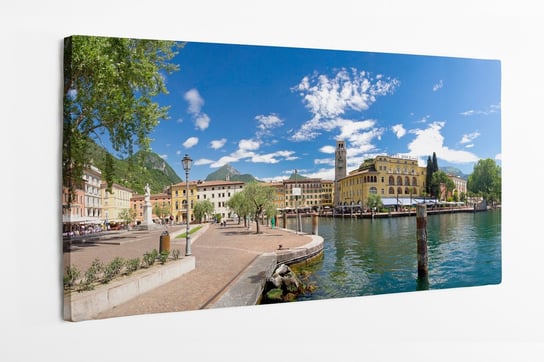 Obraz na płótnie HOMEPRINT, Riva del Garda, promenada, jezioro Garda, dzwonnica, port, Włochy 100x50 cm HOMEPRINT