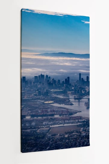Obraz na płótnie HOMEPRINT, widok z samolotu, panorama , z góry, miasto, chmury, mgła o poranku 50x100 cm HOMEPRINT