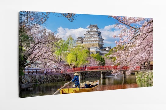 Obraz na płótnie HOMEPRINT, zamek Himeji i kwiaty wiśni na wiosnę, Japonia. 100x50 cm HOMEPRINT