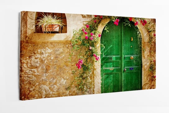 Obraz na płótnie HOMEPRINT, zielone drzwi, kwiaty na ścianie, ściana, słoneczny dzień, Grecja 125x50 cm HOMEPRINT