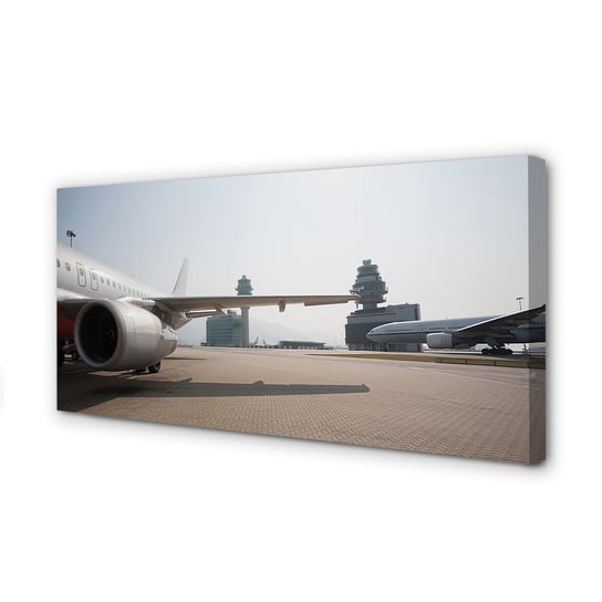Obraz na płótnie TULUP Samolot budynki lotnisko 100x50 cm Tulup