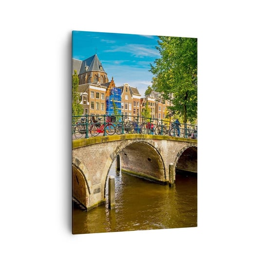 Obraz na płótnie - Wiosna nad kanałem - 70x100cm - Miasto Amsterdam Architektura - Nowoczesny foto obraz w ramie do salonu do sypialni ARTTOR ARTTOR