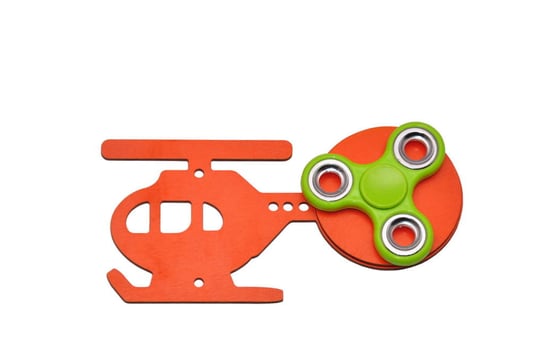 Pomarańczowy helikopter, zielony spinner do tablicy sensorycznej. Zabawki Sensoryczne