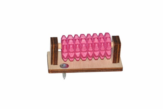 Różowy kołowrotek masażer - tablice manipulacyjne. Zabawki Sensoryczne