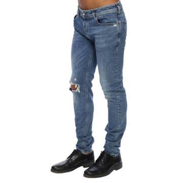 Spodnie Diesel męskie jeansy rurki z dziurami-W29 Inna marka