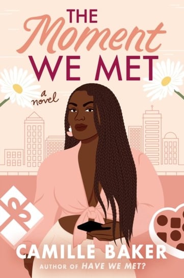 The Moment We Met: A Novel Camille Baker