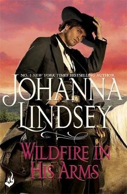 Wildfire In His Arms: A dangerous gunfighter falls for a beautiful outlaw in this compelling historical romance from the legendary bestseller Lindsey Johanna