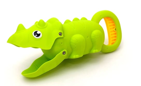 Zielony zabawkowy chwytak w kształcie dinozaura. ZDTRADING
